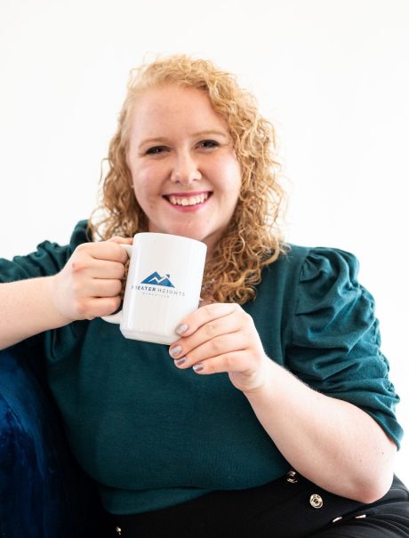 Hailey holding coffee mug